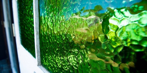 Slow architecture house The Ecovillage stained glass